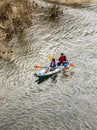 Couple Canoeing on the River